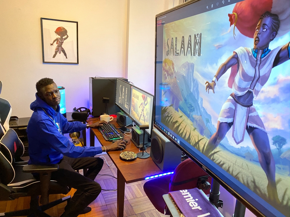 Video game developer Lual Mayen, 25, who learned to code in a refugee camp after fleeing South Sudan, plays his new game at his home in Washington, D.C., U.S., January 7, 2020.( REUTERS/Lucy Nicholson)