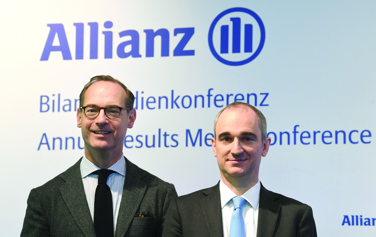 Oliver Baete (L), CEO of German insurance group Allianz, and Allianz CFO Giulio Terzariol, pose prior to the company's annual results press conference in Munich, southern Germany, on February 21, 2020. / AFP / Christof Stache
