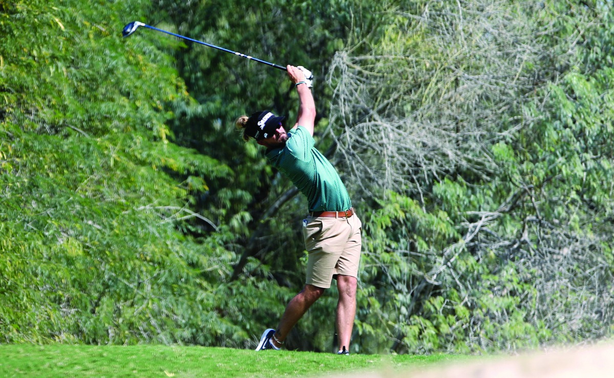England's Brandon Robinson Thompson in action during the Qatar Open Amateur Golf Championship at the Doha Golf Club yesterday. Pictures: Syed Omar