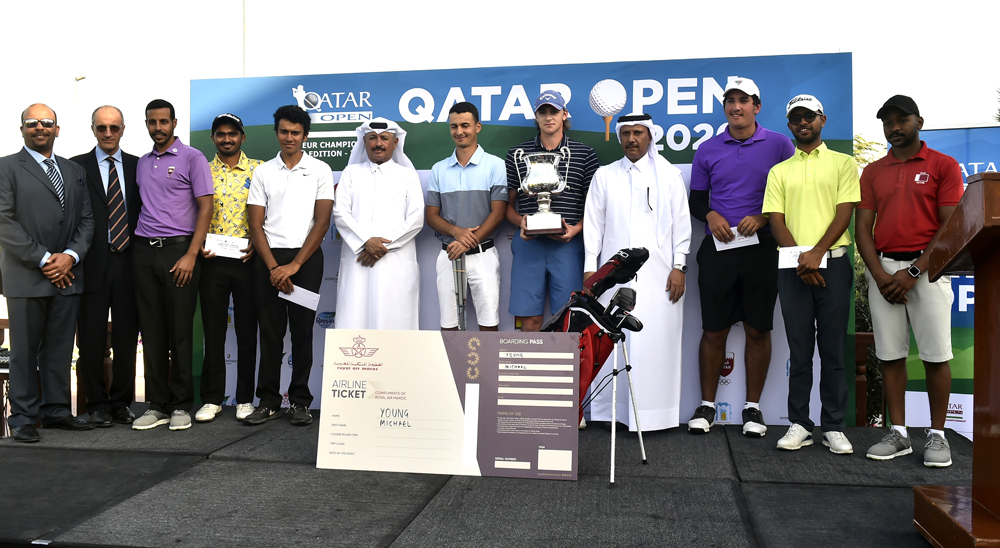 Michael Young of Ireland, winner of the Qatar Open Amateur Golf Championship, poses for a picture with other podium winners and officials of Qatar Golf Association at Doha Golf Club yesterday. Pictures: Syed Omar