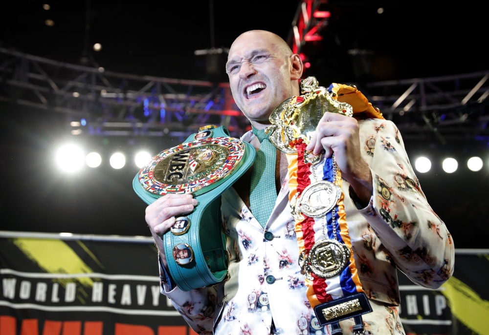  Tyson Fury poses with his belts during a press conference after the fight REUTERS/Steve Marcus
