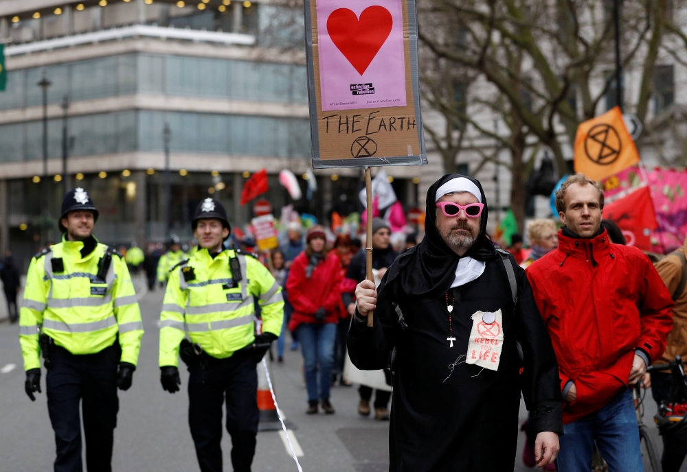 Demonstrators from Extinction Rebellion and Parents 4 Future march in a joint protest over climate change, in London, Britain, February 22, 2020. REUTERS/Peter Nicholls