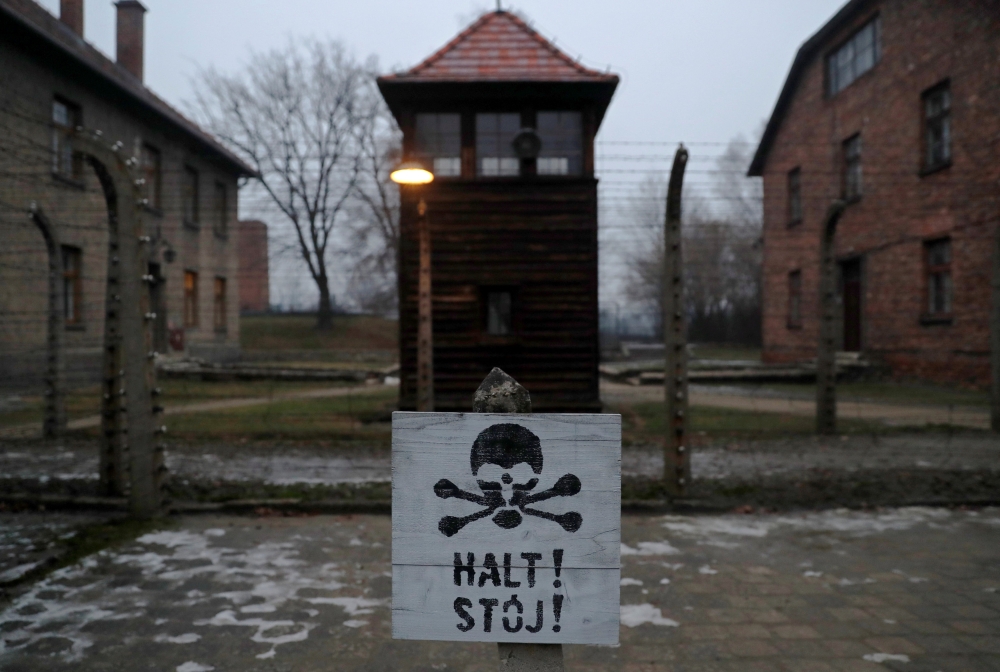 A sign reading ‘Stop German and Polish’ is seen at the former Nazi German concentration and extermination camp, Auschwitz. Reuters file photo /  Kacper Pempel