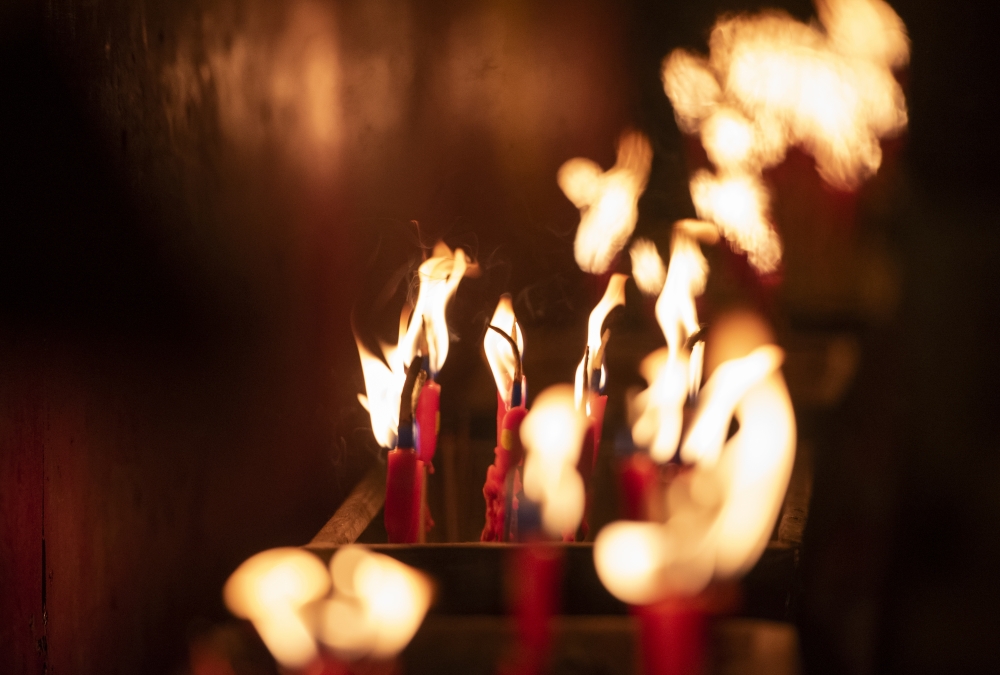 Candles are seen at the Lin Fa Kung temple during the Kwun Yum Treasury festival in Hong Kong, China on February 18, 2020. (Miguel Candela Poblacion / Anadolu Agency)
 
 