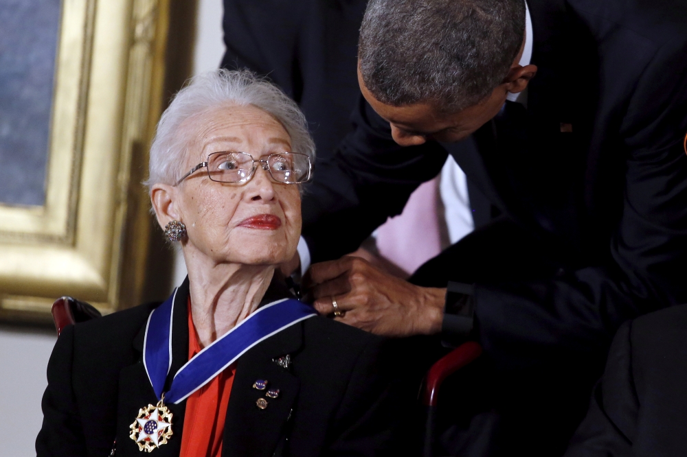 US President Barack Obama presents the Presidential Medal of Freedom to NASA mathematician Katherine G. Johnson during an event in the East Room of the White House in Washington November 24, 2015. Reuters/Carlos Barria