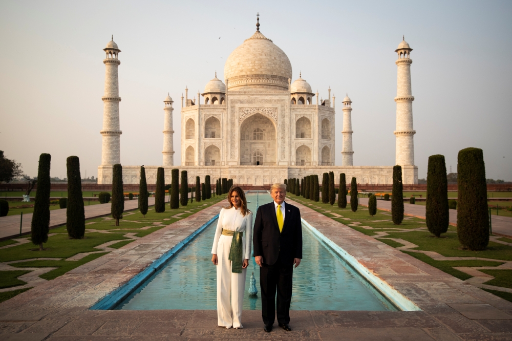 US President Donald Trump and first lady Melania Trump tour the historic Taj Mahal, in Agra, India, February 24, 2020. Reuters/Al Drago
 
 