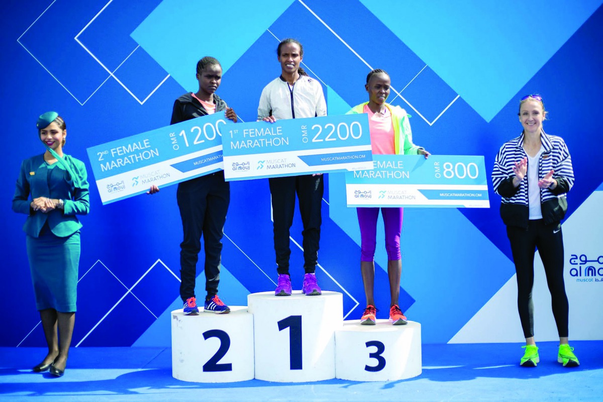 The podium winners of the women's Al Mouj Muscat Marathon, Ethiopia’s Astede Habtamu (second, left); silver winner, Kenya’s Perez Jerubet (left) and  Bency Cheruiyot with British former world  marathon champion Paula Radcliffe during the presentation cere