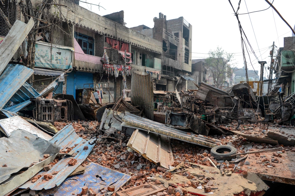 A general view of burnt-out and damaged residential premises and shops following clashes between people supporting and opposing a contentious amendment to India's citizenship law, in New Delhi on February 26, 2020. AFP / Sajjad Hussain