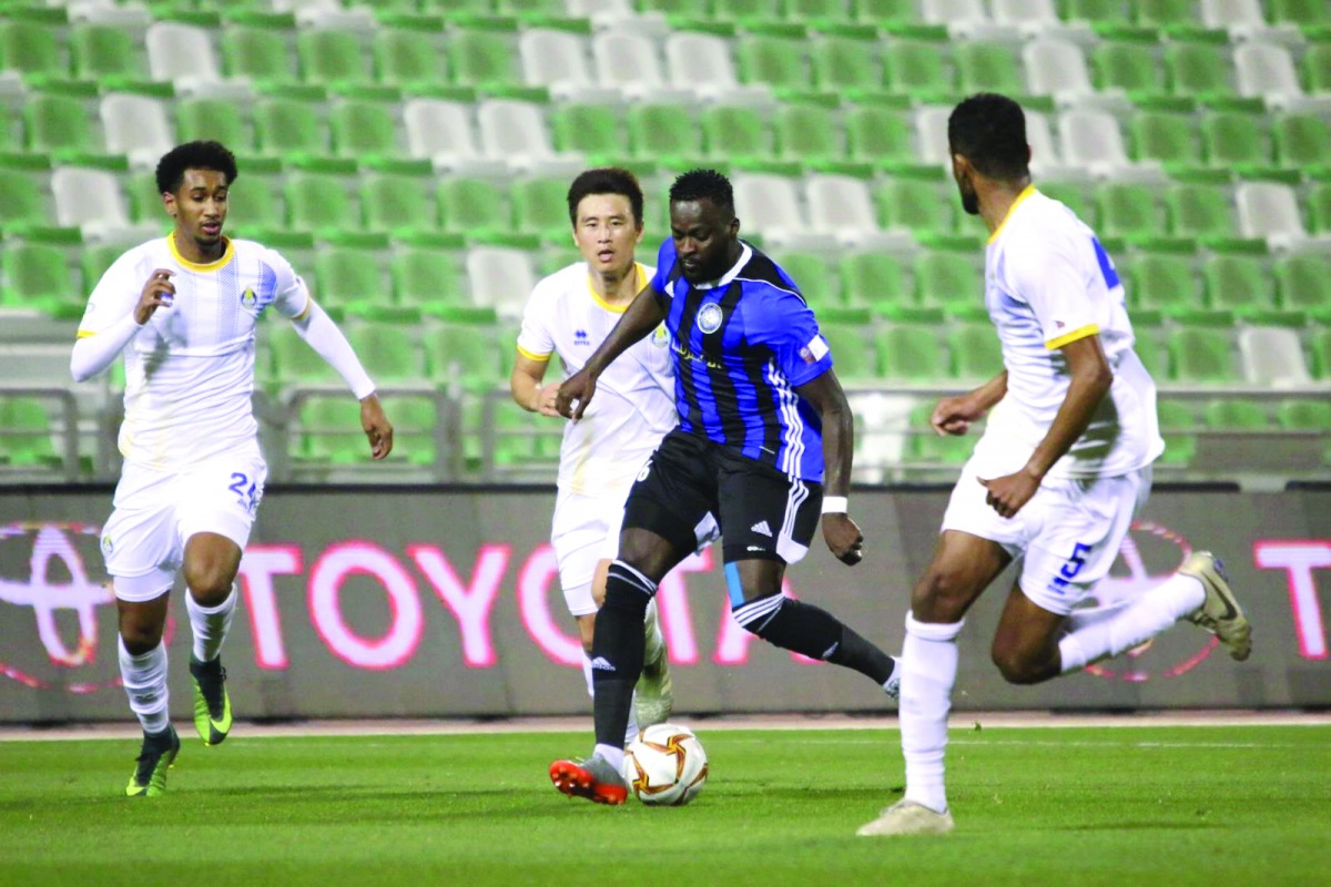 Al Sailiya player controls the ball as Al Gharafa defenders try to stop him from advancing during their Round 16 match at the QNB Stars League at Al Ahli Stadium yesterday. Al Sailiya won the match 2-0


