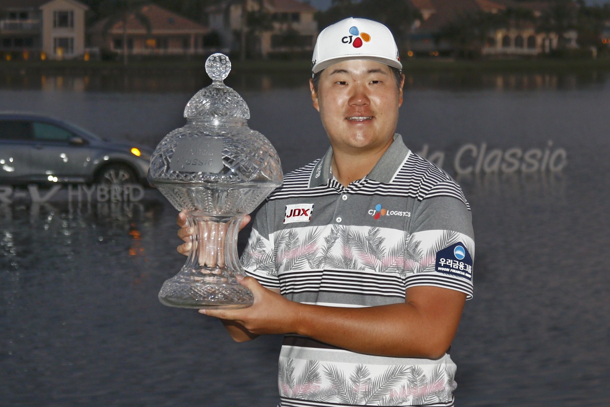 Sungjae Im holds up the champions trophy after winning the 2020 Honda Classic golf tournament at PGA National (Champion). Credit: Reinhold Matay-USA TODAY Sports