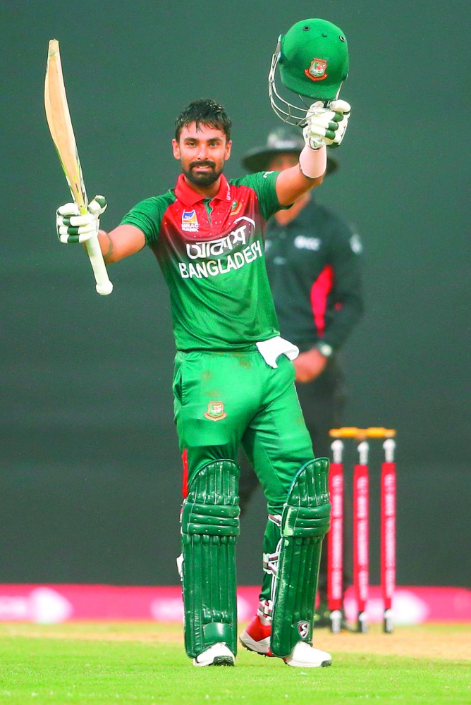 Bangladesh’s Liton Das celebrates after scoring a century (100 runs) during the third one day international (ODI) cricket match between Bangladesh and Zimbabwe at the International Cricket Stadium in Sylhet on March 6, 2020. AFP
 