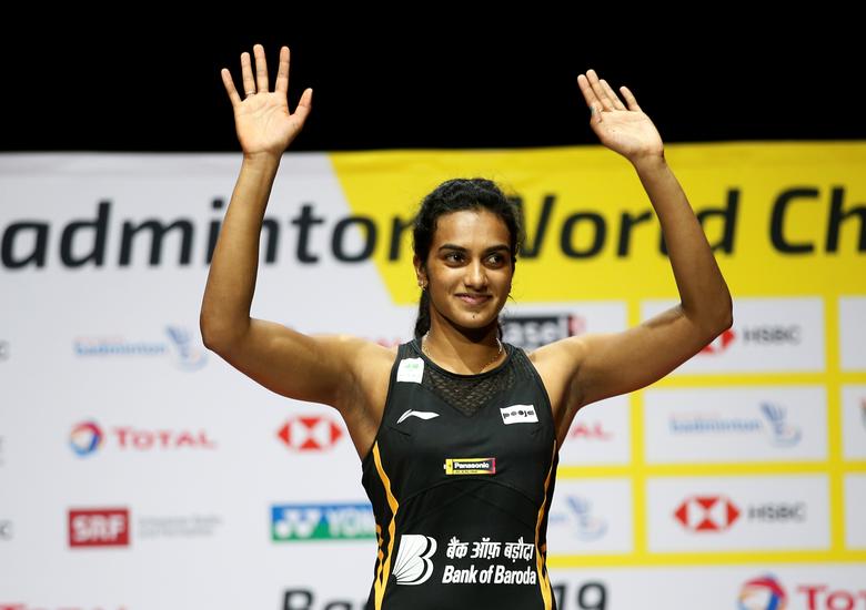 File Photo: 2019 Badminton World Championships - St. Jakobshalle Basel, Basel, Switzerland - August 25, 2019 India's Pusarla Sindhu celebrates on the podium after winning the women's singles final. REUTERS/Vincent Kessler