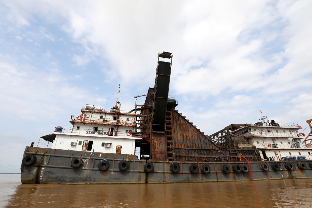 The Star Optimus, a hopper dredger vessel that belongs to Starhigh Asia Pacific, sits docked on the Salween river in Mawlamyine, Mon state, Myanmar September 18, 2019. 2019. Reuters/Ann Wang