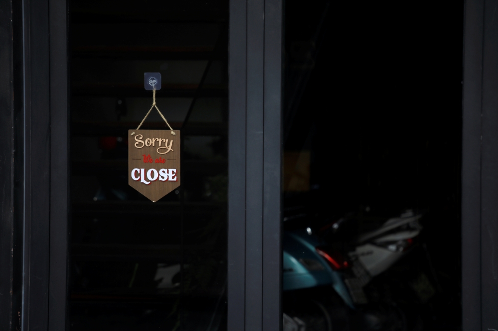 A closed cafe, near the house of a coronavirus infected patient, is seen in Hanoi, Vietnam March 10, 2020. REUTERS/Kham