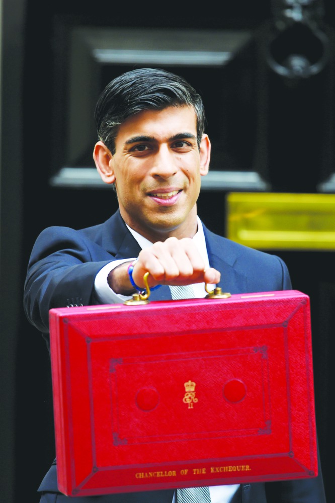 Chancellor of the Exchequer, Rishi Sunak poses outside no.11 Downing Street before delivering the first post-Brexit budget in London, United Kingdom on March 11, 2020. (Kate Green/ Anadolu Agency)