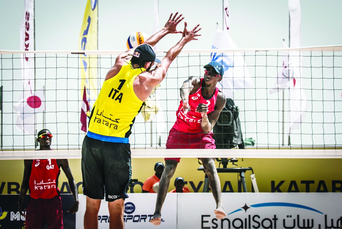 Qatar's Cherif Younousse (right) in action against Italians Paolo Nicolai and Daniele Lupo in yesterday's main round clash. 
