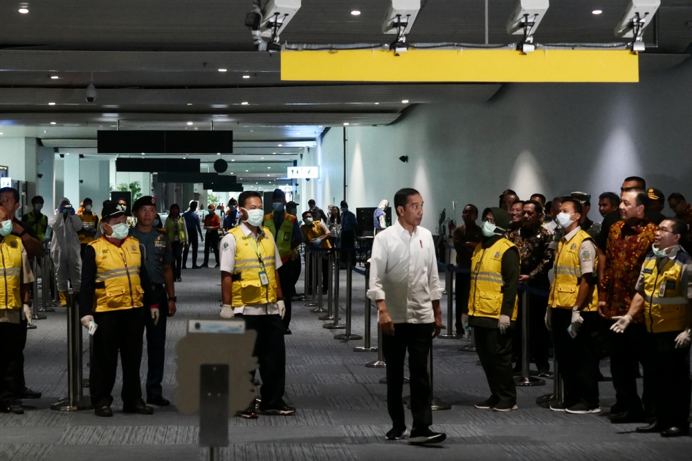 TANGERANG, INDONESIA - MARCH 13: Indonesian President Joko Widodo checks precautions against the coronavirus (Covid-19) at Soekarno-Hatta Airport in Tangerang, Indonesia on March 13, 2020. Indonesia has confirmed four deaths and 69 positive cases of Coron