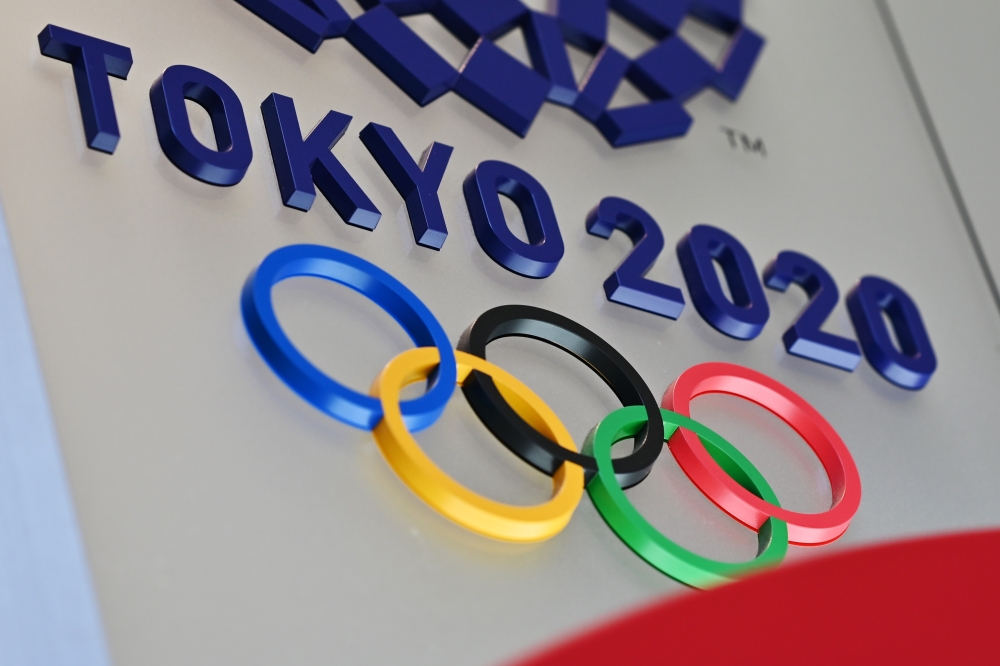 The logo for the Tokyo 2020 Olympic Games is seen in Tokyo on March 15, 2020. AFP / CHARLY TRIBALLEAU