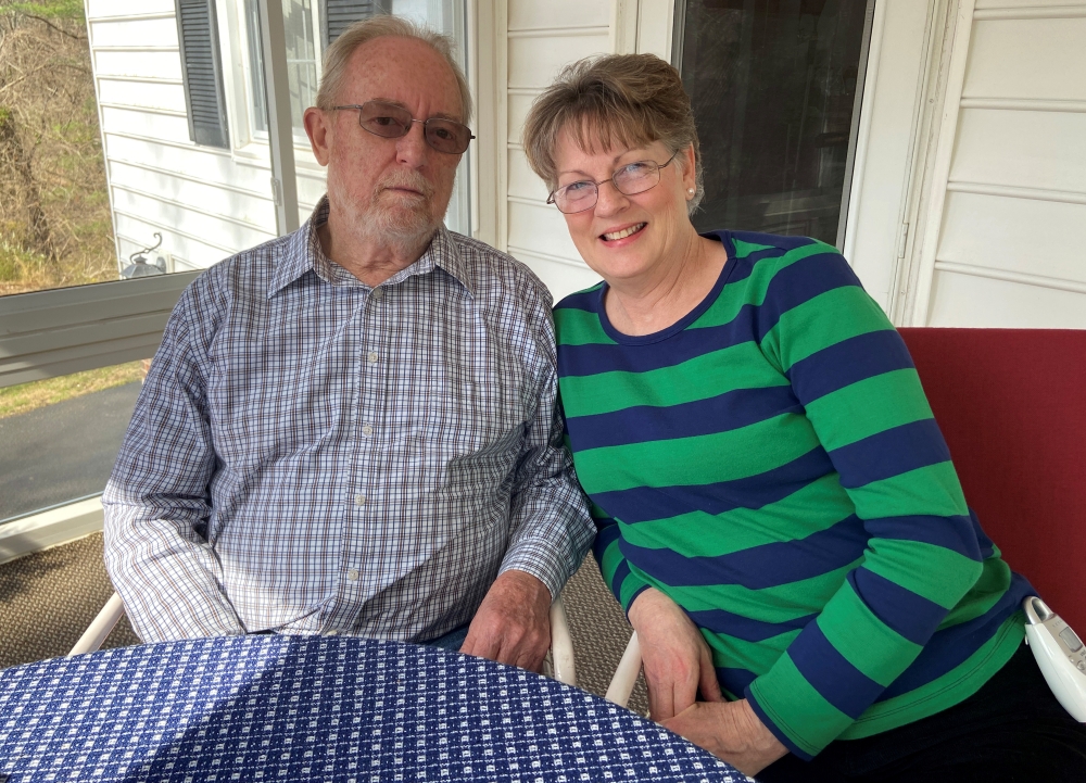 Grace Dowell, 63, and her husband Donald Dowell, 74, pose for a photo at their home in Sunderland, Maryland, U.S., March 18, 2020. Picture taken March 18, 2020. REUTERS/Linda So