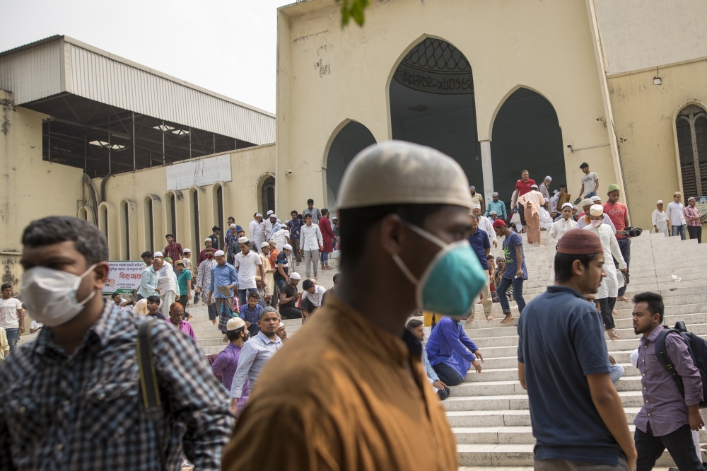 DHAKA, bangladesh - MARCH 20 : Muslims attend Friday prayer with face masks amid coronavirus (Covid-19) outbreak in Dhaka, bangladesh on March 20, 2020. ( Zakir Hossain Chowdhury - Anadolu Agency )
