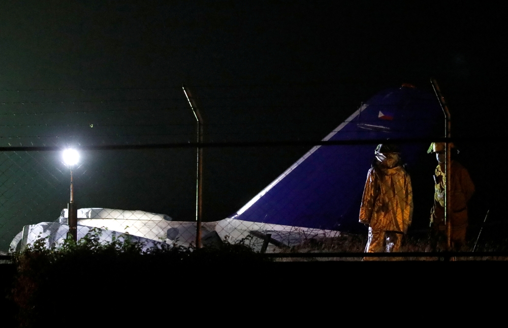 Debris of the Lion Air medical evacuation plane, that exploded during takeoff, is seen on the runway of Manila International Airport in Pasay City, Philippines March 29, 2020. REUTERS/Eloisa Lopez