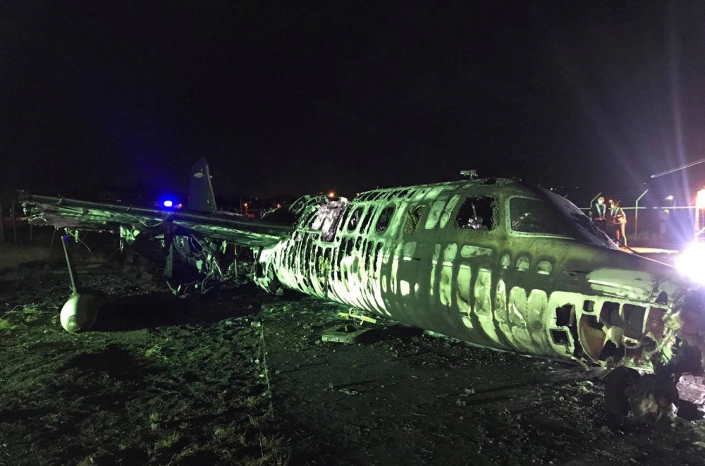 Debris of the crashed plane are seen at Pasay City, Metro Manila, Philippines, March 29, 2020. Manila International Airport Authority Media Affairs Division/Handout via REUTERS