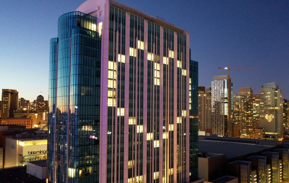 SAN FRANCISCO, CALIFORNIA - APRIL 01: Window lights are illuminated in the shape of a heart at the InterContinental San Francisco Hotel on April 01, 2020 in San Francisco, California. . Justin Sullivan/AFP