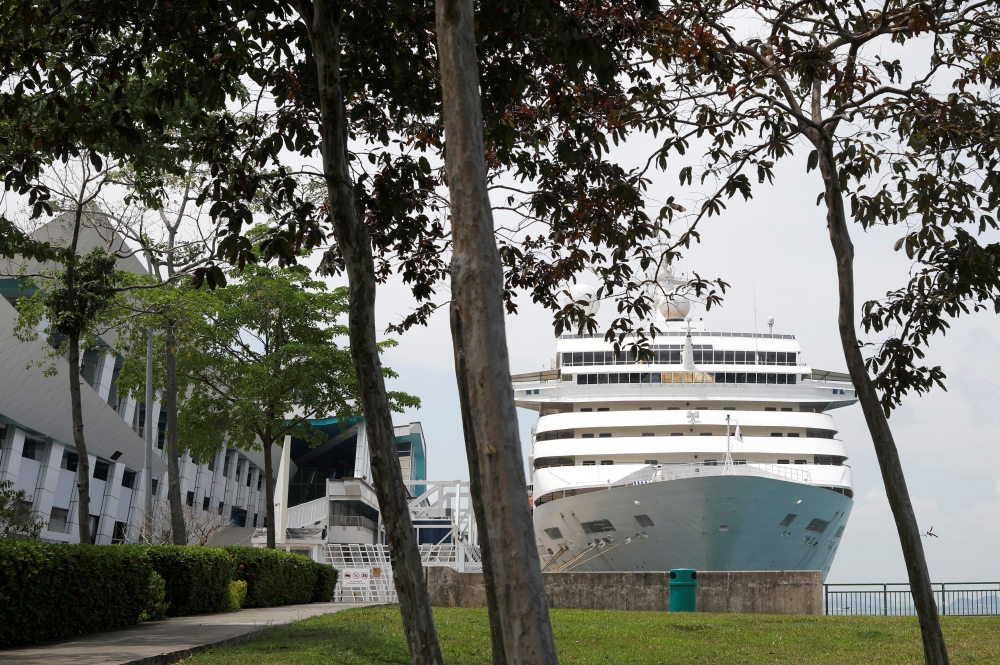 View of Star Cruise's Superstar Gemini, which is currently being accessed for use as temporary accommodation for migrant workers, berthed at Marina Bay Cruise Center, Singapore, April 17, 2020. REUTERS/Edgar Su