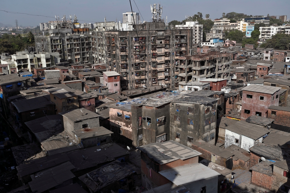 Buildings stand in Dharavi, one of Asia's largest slums, during a nationwide lockdown in India to slow the spread of COVID-19, during the coronavirus disease outbreak, in Mumbai, India, April 7, 2020. REUTERS/Francis Mascarenhas 