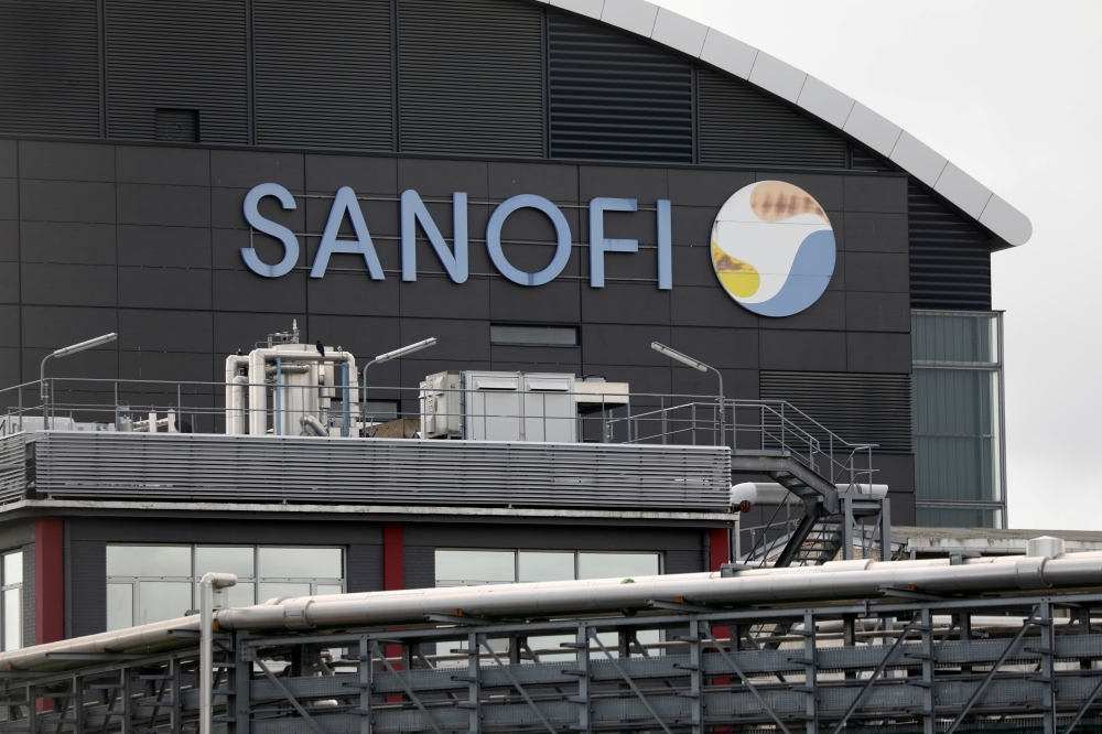 FILE PHOTO: The logo of Sanofi is seen at the company's research and production centre in Vitry-sur-Seine, France, August 6, 2019. REUTERS/Charles Platiau/File Photo