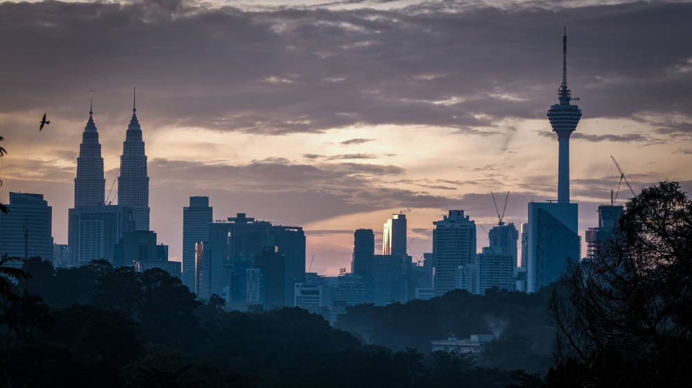 KUALA LUMPUR, MALAYSIA - APRIL 22: A view of Kuala Lumpur City at dawn on Earth Day 2020 taken from the top of Kenny Hills in Kuala Lumpur, Malaysia, on April 22, 2020. ( Syaiful Redzuan - Anadolu Agency )
