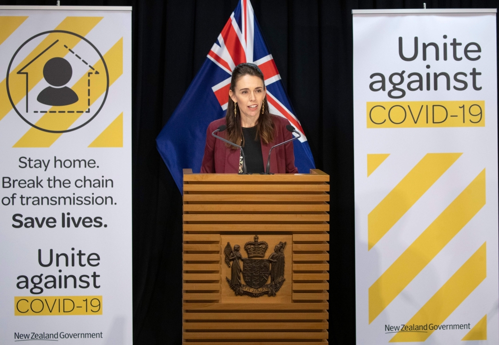 New Zealand's Prime Minister Jacinda Ardern briefs the media about the COVIS-19 coronavirus at the Parliament House in Wellington on April 27, 2020.  / AFP / POOL / Mark Mitchell

