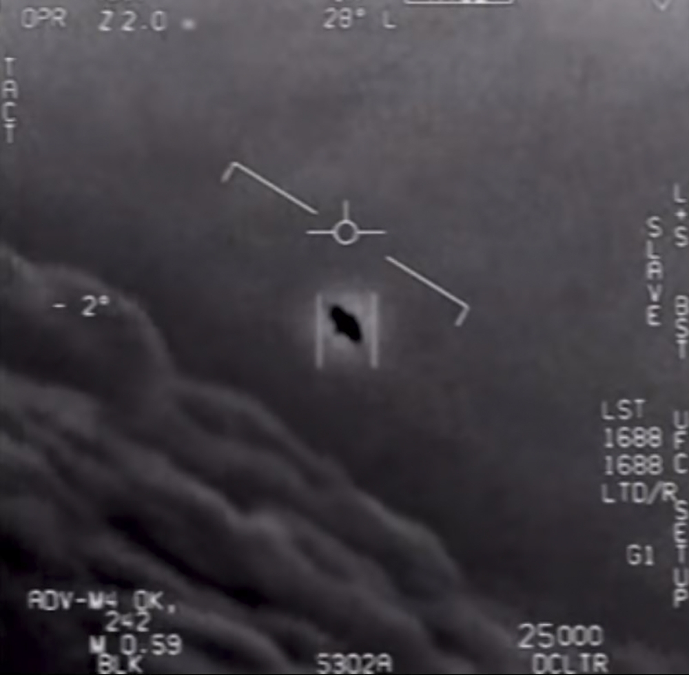 This video grab image obtained April 28, 2020 courtesy of the US Department of Defense shows part of an unclassified video taken by Navy pilots that have circulated for years showing interactions with 