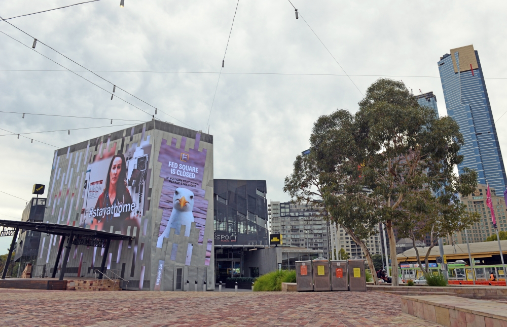 MELBOURNE, AUSTRALIA - APRIL 28: People walk at the city centre after streets and roads remain nearly empty following a great number of shops are being closed within coronavirus (COVID-19) restrictions in Melbourne, Australia on April 28, 2020. COVID-19 d