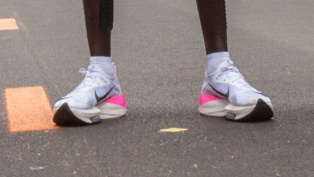 This file photograph taken on October 12, 2019, shows the controversial Nike AlphaFly prototype shoes worn by Kenya's Eliud Kipchoge as he stands after his attempt to bust the mythical two-hour barrier for the marathon in Prater Park, Vienna, with an unof