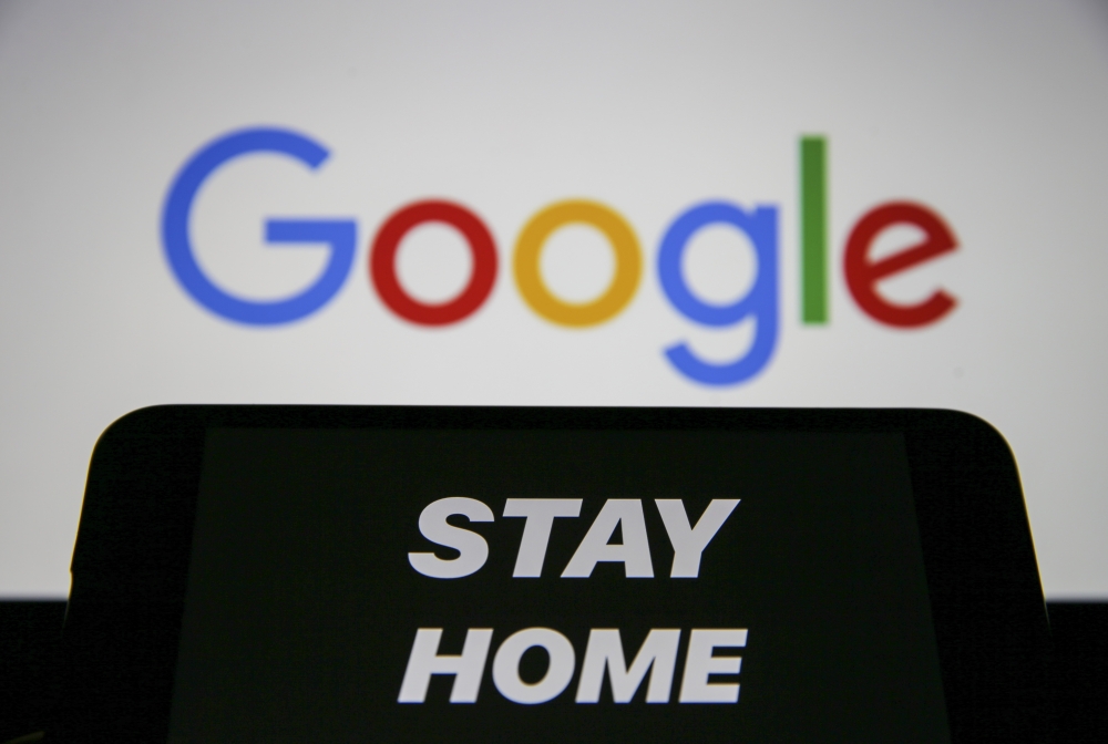 :ANKARA, TURKEY - MAY 15: In this illustration photo, Google's logo is displayed on a laptop screen with Stay Home warning in Ankara, Turkey on May 15, 2020. ( Muhammed Selim Korkutata - Anadolu Agency )
