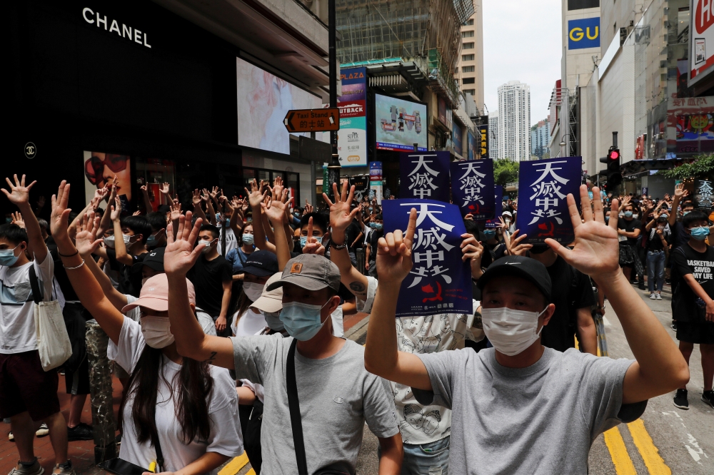 Anti-government protesters march again Beijing's plans to impose national security legislation in Hong Kong, China May 24, 2020. REUTERS/Tyrone Siu 