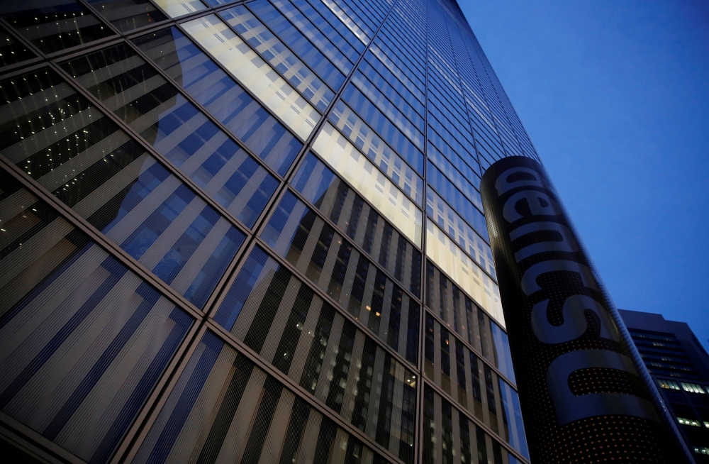 FILE PHOTO: Dentsu's logo is seen at its head office building in Tokyo, Japan, Aug. 9, 2019. REUTERS/Kim Kyung-Hoon/File Photo
