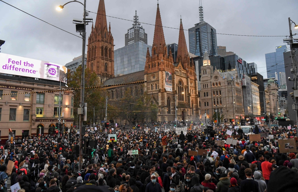 Demonstrators attend a Black Lives Matter protest to express solidarity with US protestors in Melbourne on June 6, 2020. AFP / William WEST