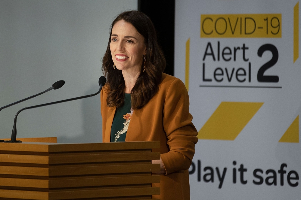 New Zealand's Prime Minister Jacinda Ardern takes part in a press conference about the COVID-19 coronavirus at Parliament in Wellington on June 8, 2020. AFP / Marty MELVILLE
 