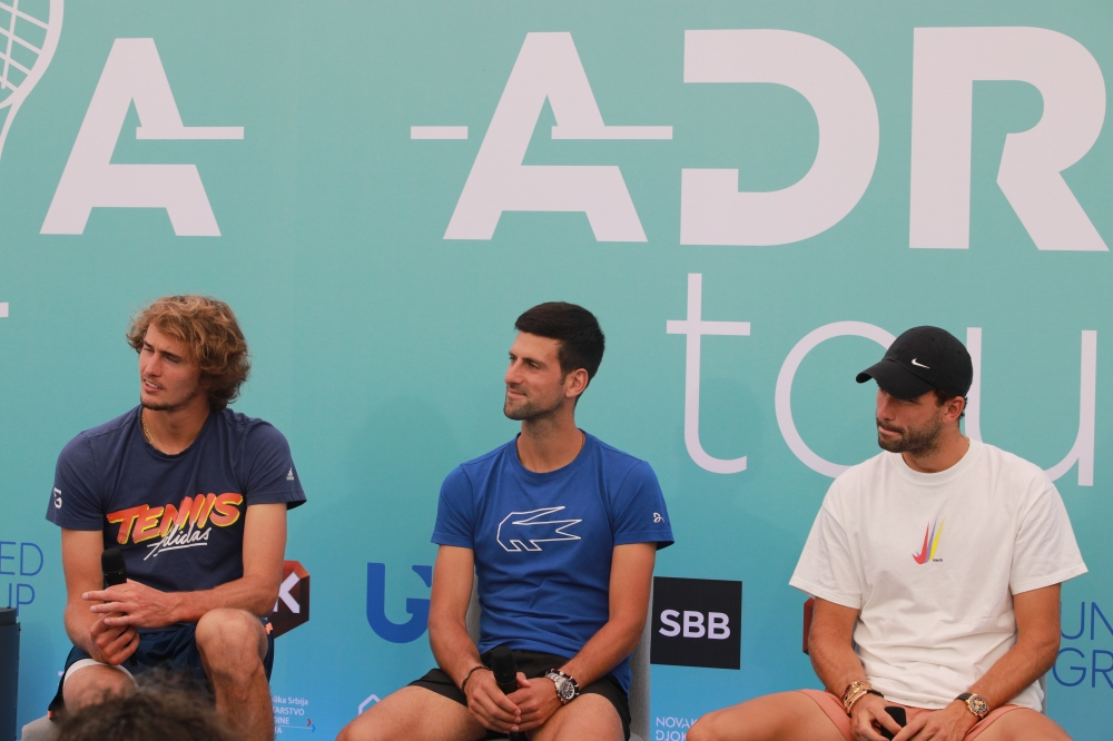 Tennis players Novak Djokovic (C), Dominic Thiem (not seen), Alexander Zverev (L), Grigor Dimitrov (R) attend a press conference during an opening program of the Adria Tour, a charity exhibition hosted by Novak Djokovic Foundation, on June 12, 2020 in Bel