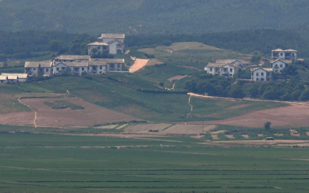 North Korean border county of Kaepoong is seen from a South Korean observation post in the border city of Paju on June 17, 2020.  AFP / Jung Yeon-je