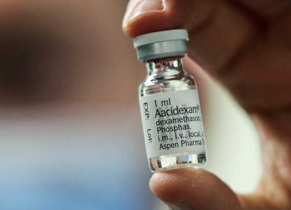 A pharmacist displays an ampoule of Dexamethasone at the Erasme Hospital amid the coronavirus disease (COVID-19) outbreak, in Brussels, Belgium, June 16, 2020. REUTERS/Yves Herman