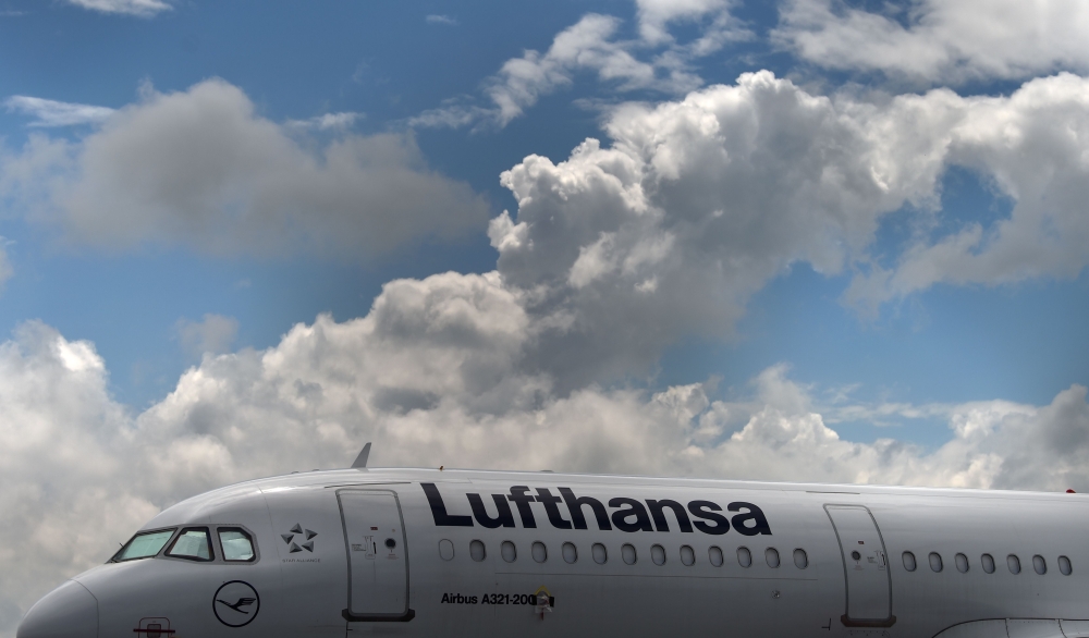 (FILES) In this file photo taken on June 11, 2020 an Airbus aircraft of the German airline Lufthansa is parked at the 