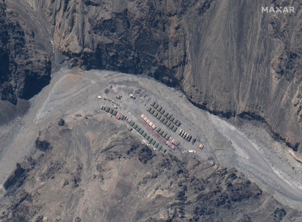This handout satellite image taken on May 22, 2020, released by Maxar Technologies shows China's People's Liberation Army (PLA) base in Galwan Valley, bordering between India and China. AFP PHOTO / Satellite image ©2020 Maxar Technologies 