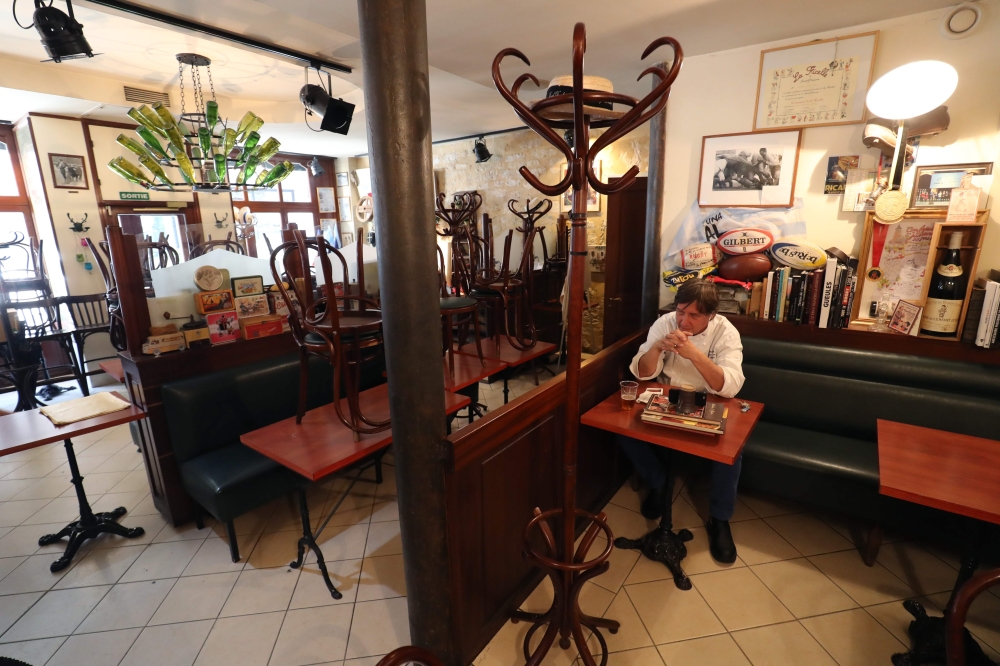 In this file photo taken on May 28, 2020 French chef and restaurant owner Alain Fontaine answers interview in his restaurant 