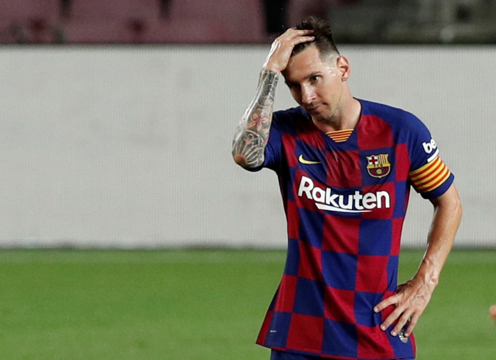  Barcelona's Lionel Messi reacts, as play resumes behind closed doors following the outbreak of the coronavirus disease (COVID-19) REUTERS/Albert Gea