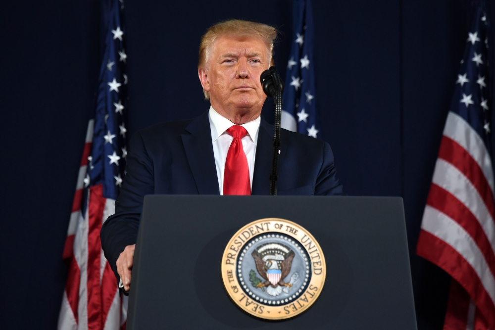 US President Donald Trump gestures as he speaks during the Independence Day events at Mount Rushmore National Memorial in Keystone, South Dakota. / AFP / SAUL LOEB