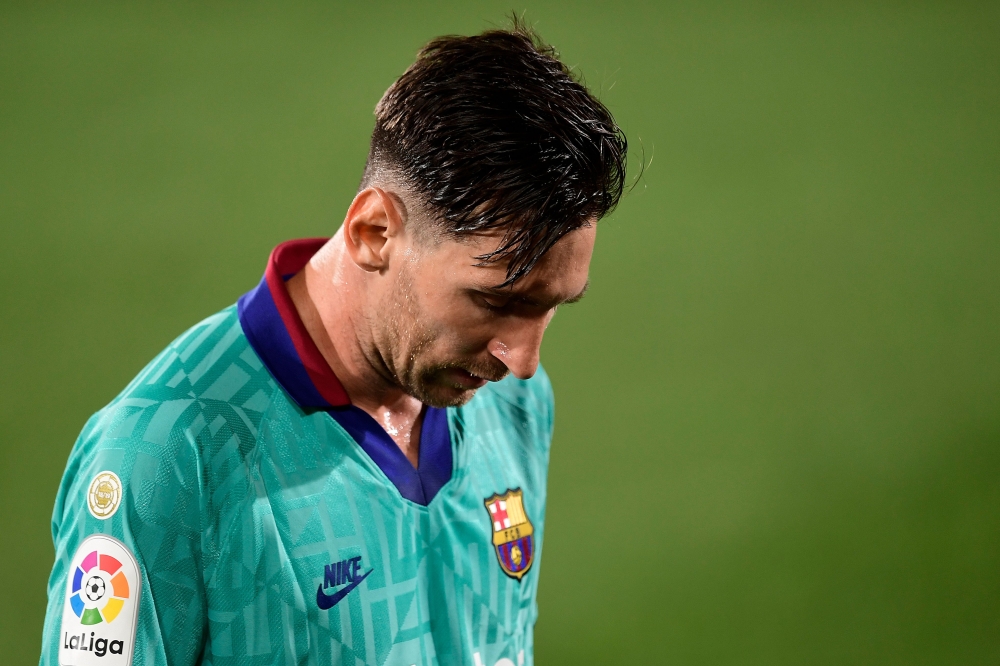 Barcelona's Argentine forward Lionel Messi reacts during the Spanish League football match between Villarreal and Barcelona at the Madrigal stadium in Villarreal on July 5, 2020. / AFP / JOSE JORDAN