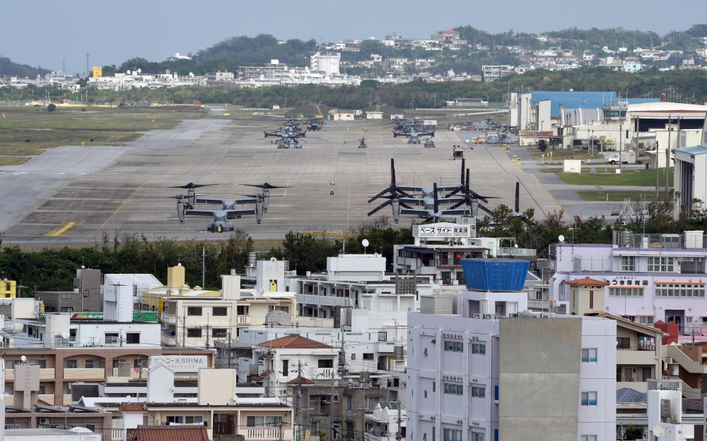 (FILES) This file photo taken on November 14, 2014 shows multi-mission tiltrotor Osprey aircraft at the US Marine's Camp Futenma in a crowded urban area of Ginowan, Okinawa prefecture. AFP / TORU YAMANAKA